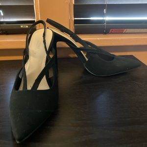 Black sling-back pumps